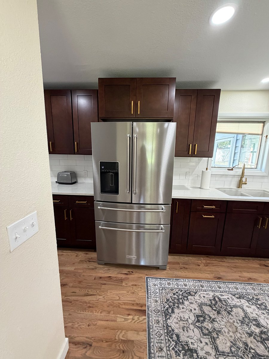 Kitchen Aide full sized refrigerator with ice/water