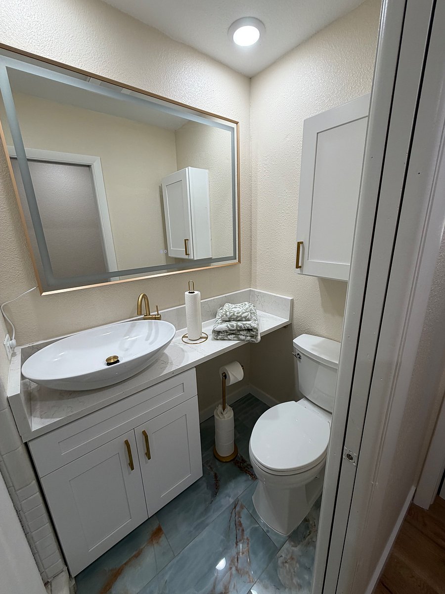 2nd bathroom, located between bedroom 2 & 3.
