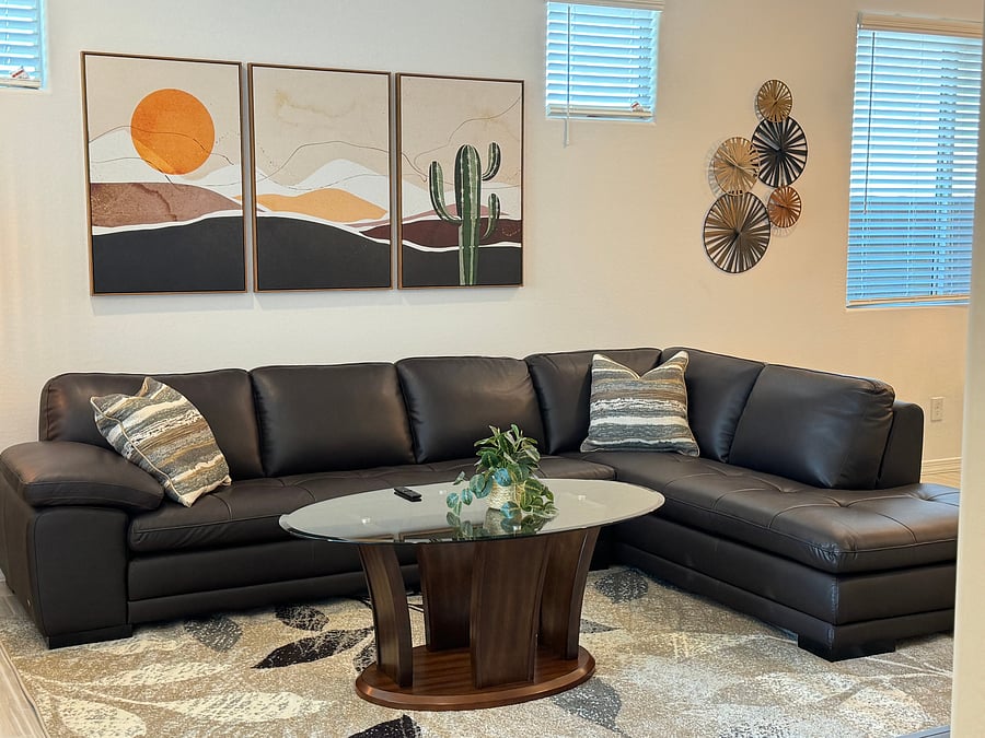 Close up of living room with comfortable L shaped couch--a desert oasis!