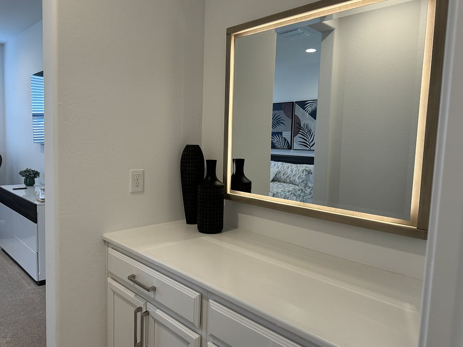 This area is at the entrance to the primary bedroom--lots of room for storage.