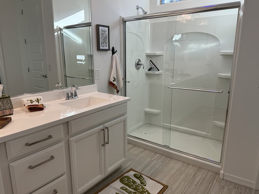 Primary bath with dual sinks and separate water closet.  There is also a good sized linen closet in the bathroom.