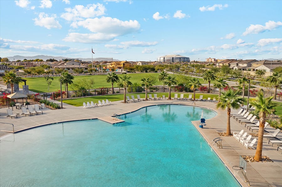View of the gorgeous heated pool with State Farm Stadium in the distance.  Only one mile away!