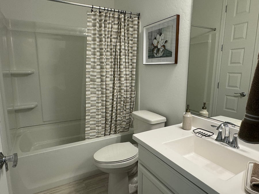 Second bathroom- tub - shower combo.