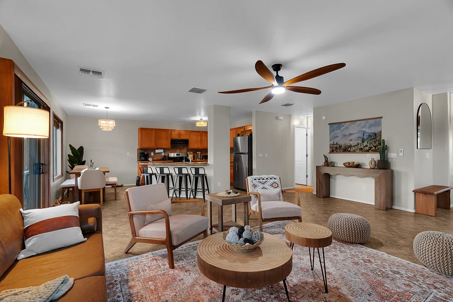 Bright, open living space with comfortable seating, stylish decor, and seamless flow into the kitchen-perfect for relaxing or gathering with your group.