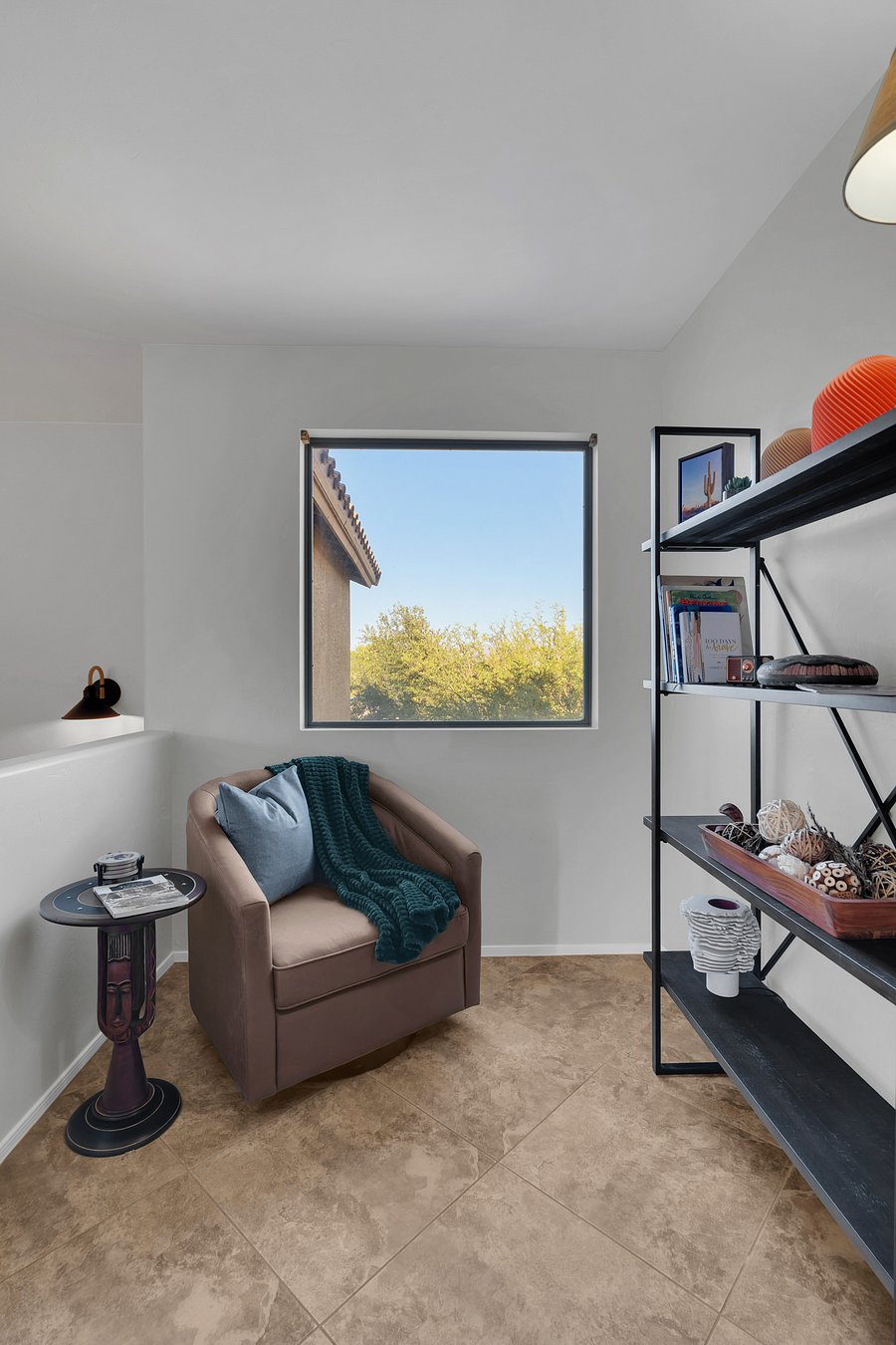 Cozy reading nook/ library with natural light-perfect for morning coffee or a quiet moment.