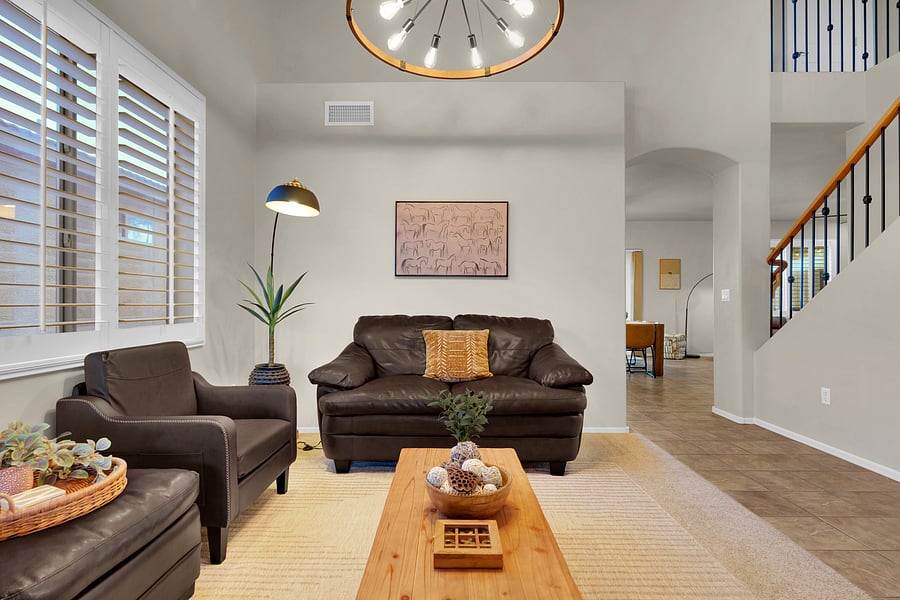 Comfortable seating, warm desert tones, and seamless flow make this inviting space the heart of your stay.