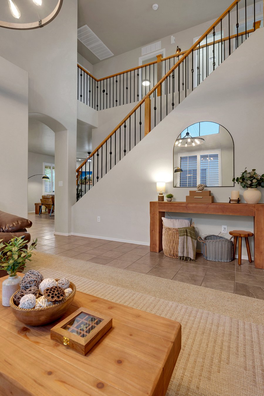 Thoughtfully designed from floor to loft: an airy open layout, sweeping staircase, and cozy styled corners that feel instantly inviting.