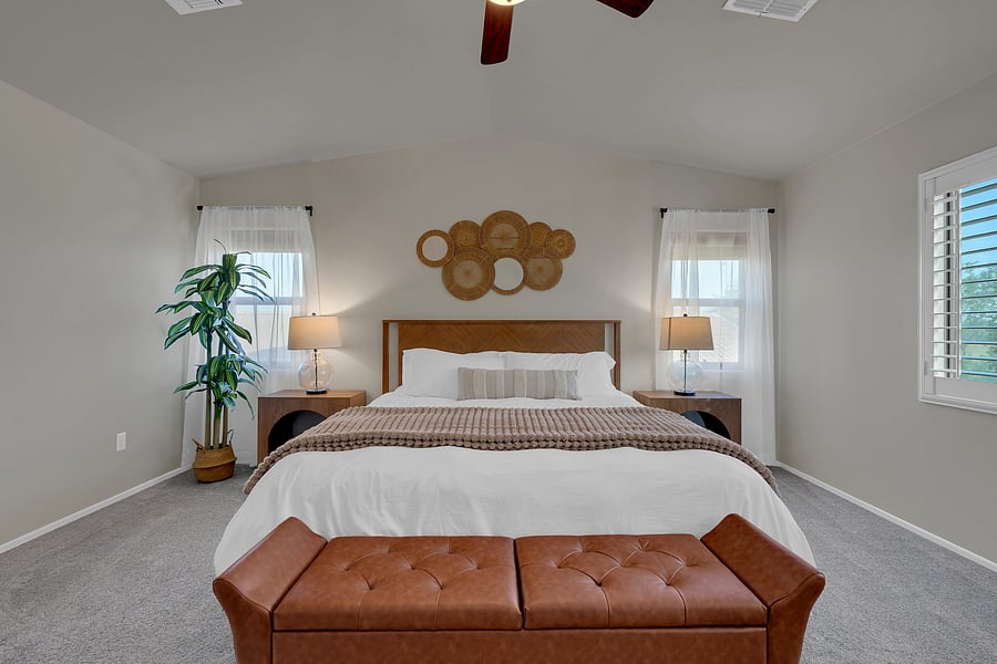 Sink into comfort in this airy master retreat, with a king bed, cozy textures, and an ensuite bath just steps away.