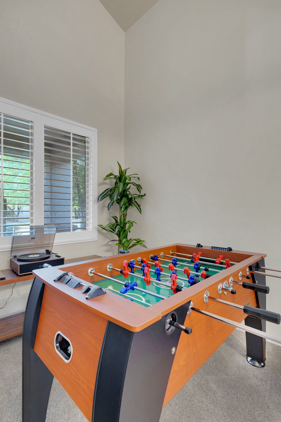 Game on! Challenge your crew to a friendly foosball match in this bright, airy game corner.