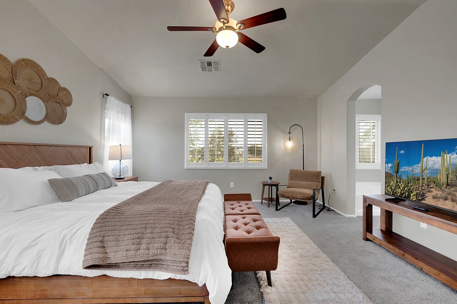 Kick back for movie night from bed, then slip into the spa-like bath steps away.