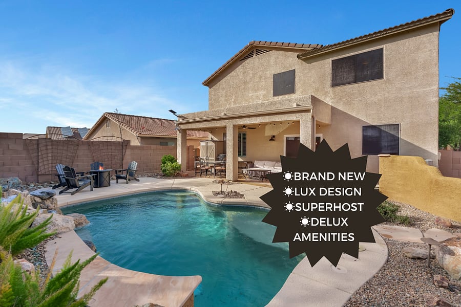 Luxe desert oasis with a sparkling pool, fire pit lounge, and shaded patio, thoughtfully designed for comfort and unforgettable evenings.