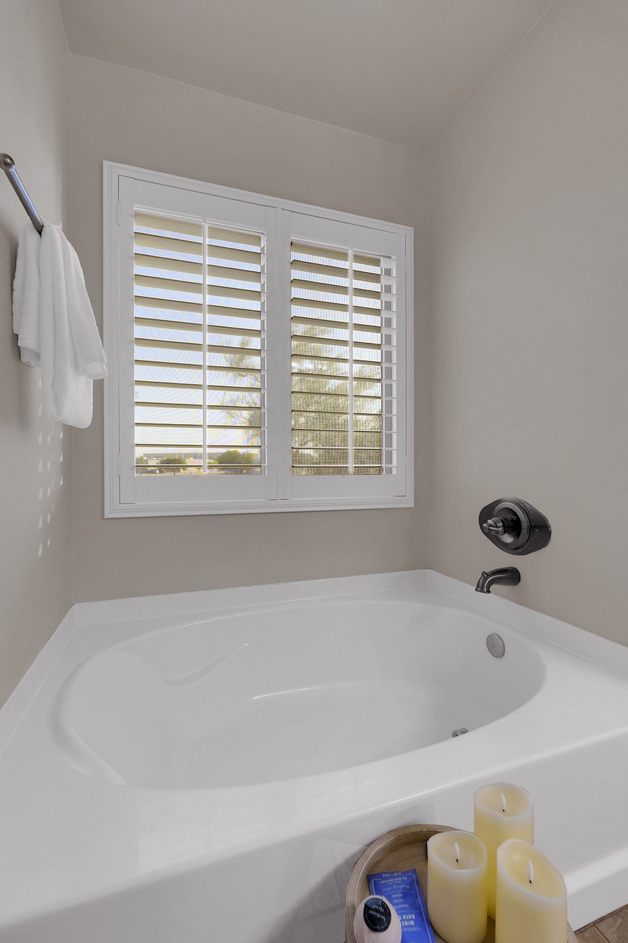Unwind in the deep soaking tub, with candlelight and bath soaks waiting for a spa-like evening.