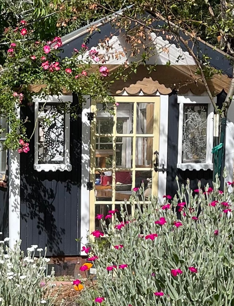 Adorable greenhouse.