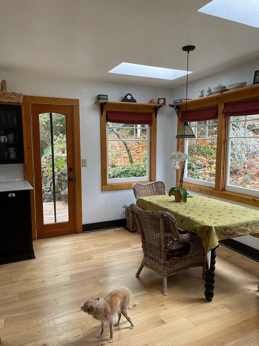 Very cozy dining room with wonderful view and occasional deer roaming through.