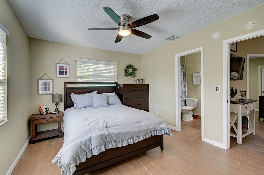Master bedroom with private bathroom, $1,250/month. Previous furnishing; furniture will differ.