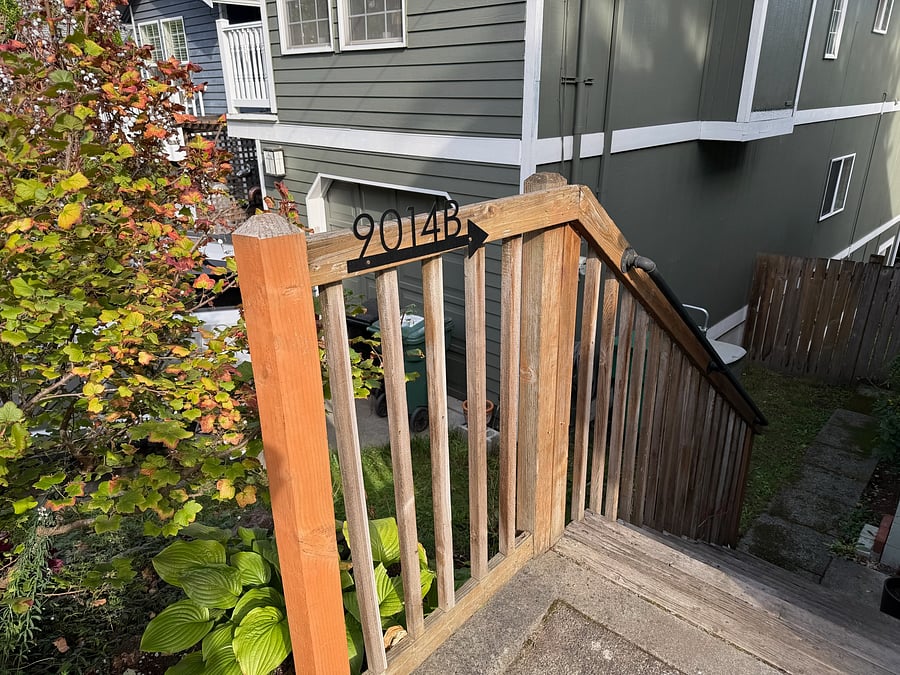 Steps down to apartment entrance