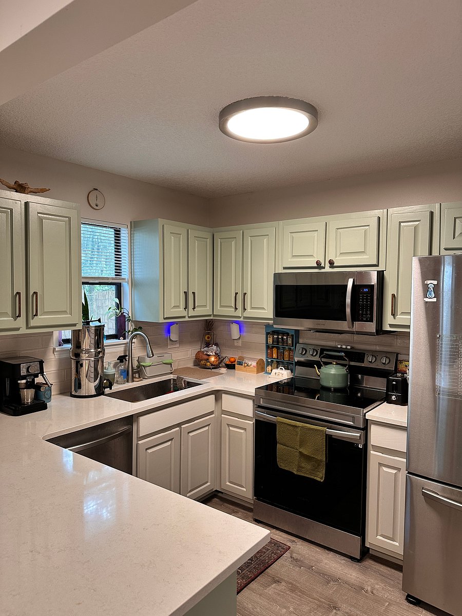 Kitchen: full fridge, electric stovetops, dishwasher, microwave, espresso machine, toaster, blender, and air fryer.