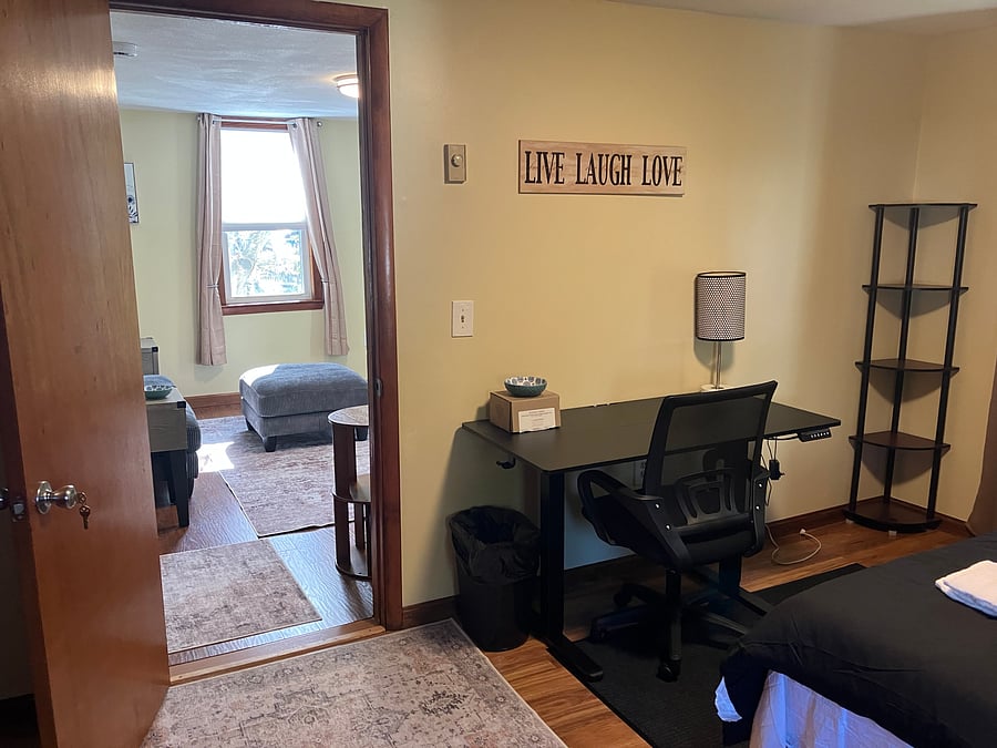 2nd floor queen size bedroom looking into living room view