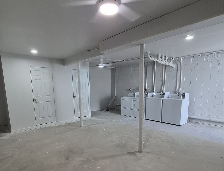 Community Laundry room shared among 9 units