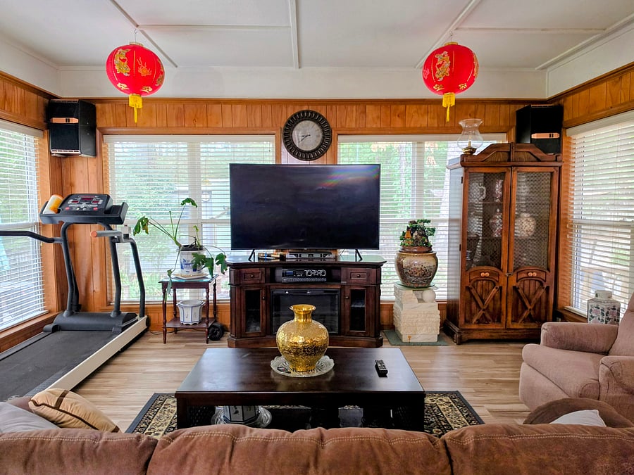 Additional living space with Smart TV, treadmill, karaoke, and Bluetooth sound system