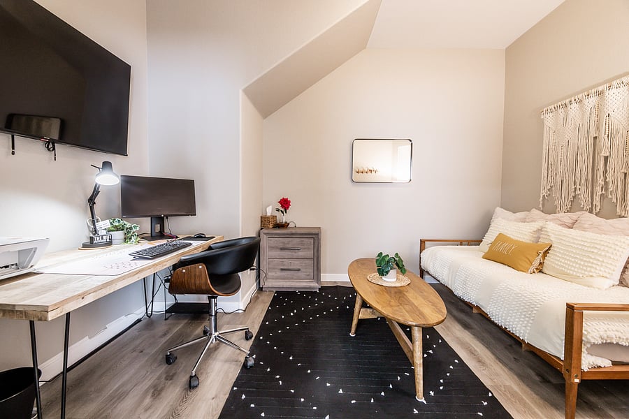 Bedroom #5 on main floor with work space and daybed