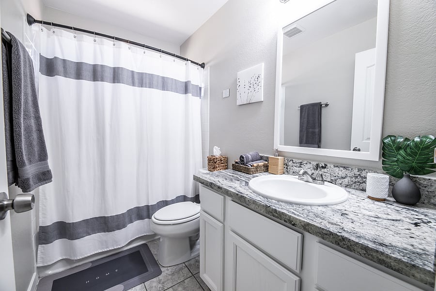 Bathroom upstairs with shower and tub combo