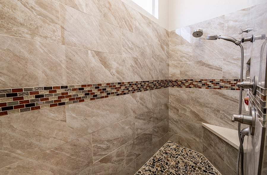 2 shower heads: hand held and rain shower head