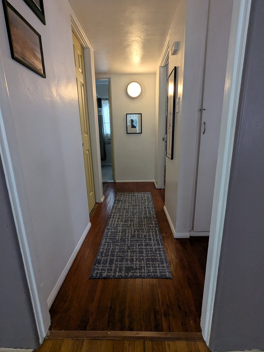 Hallway to bedrooms and bathroom 