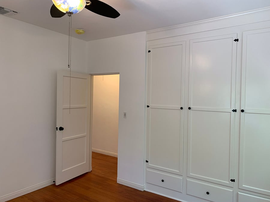 East bedroom built-in storage.