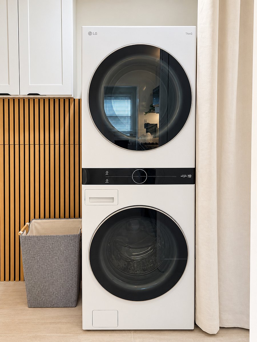 Enjoy the convenience of your own in-unit LG stacked washer and dryer, with a laundry hamper and nearby cabinetry. Perfect for extended stays.