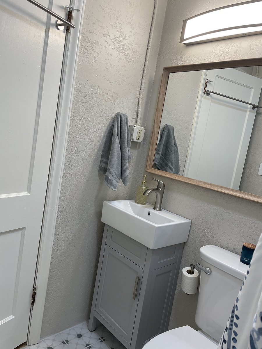 After a long day of wandering, there's nothing quite like washing away the dust of the road! Our refreshed main-floor bathroom features a walk-in shower, modern vanity, and charming patterned tile flooring.