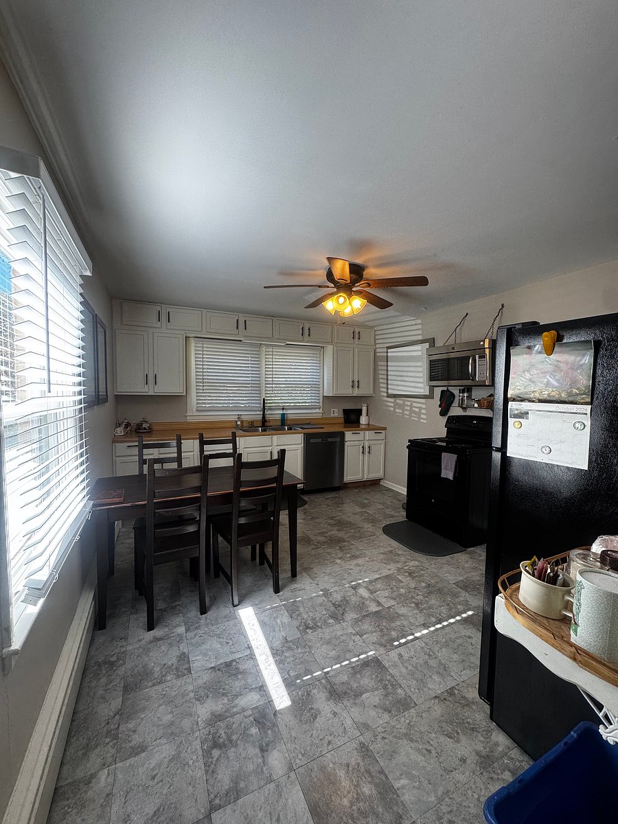Fully equipped kitchen ready for cooking or brewing your morning cup of sunshine. With plenty of cabinet space, a dining table for four, and all the essentials, there's always room to gather, share a meal, and be grateful.