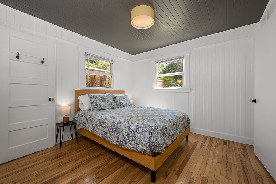 BR2 faces backyard and opens to kitchen+ bath. Large closet.