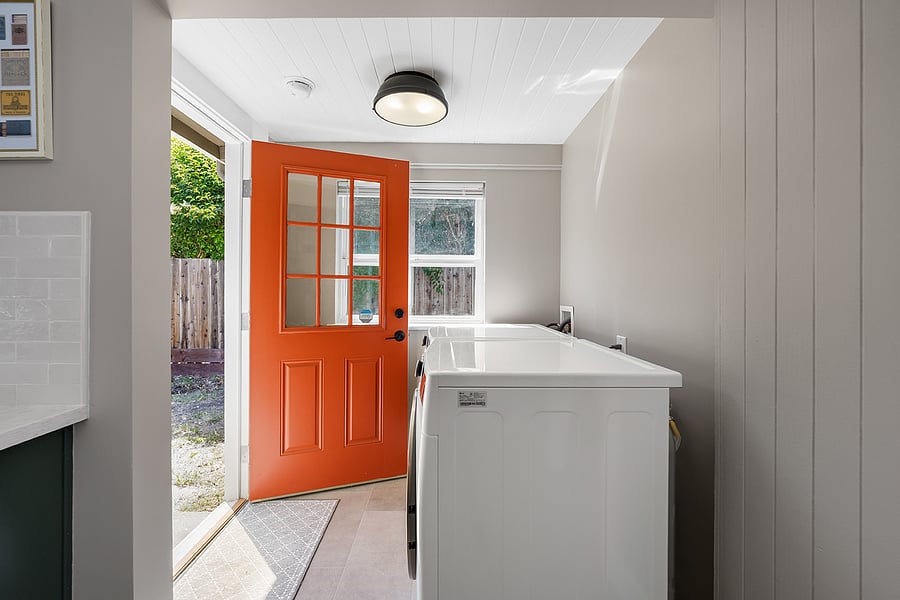 Full size new high-efficiency washer and dryer. Door opens to private fenced large backyard.