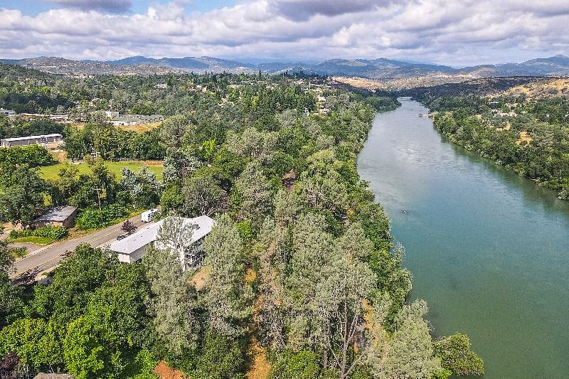 Drone view of 4 plex and view up Sacramento River