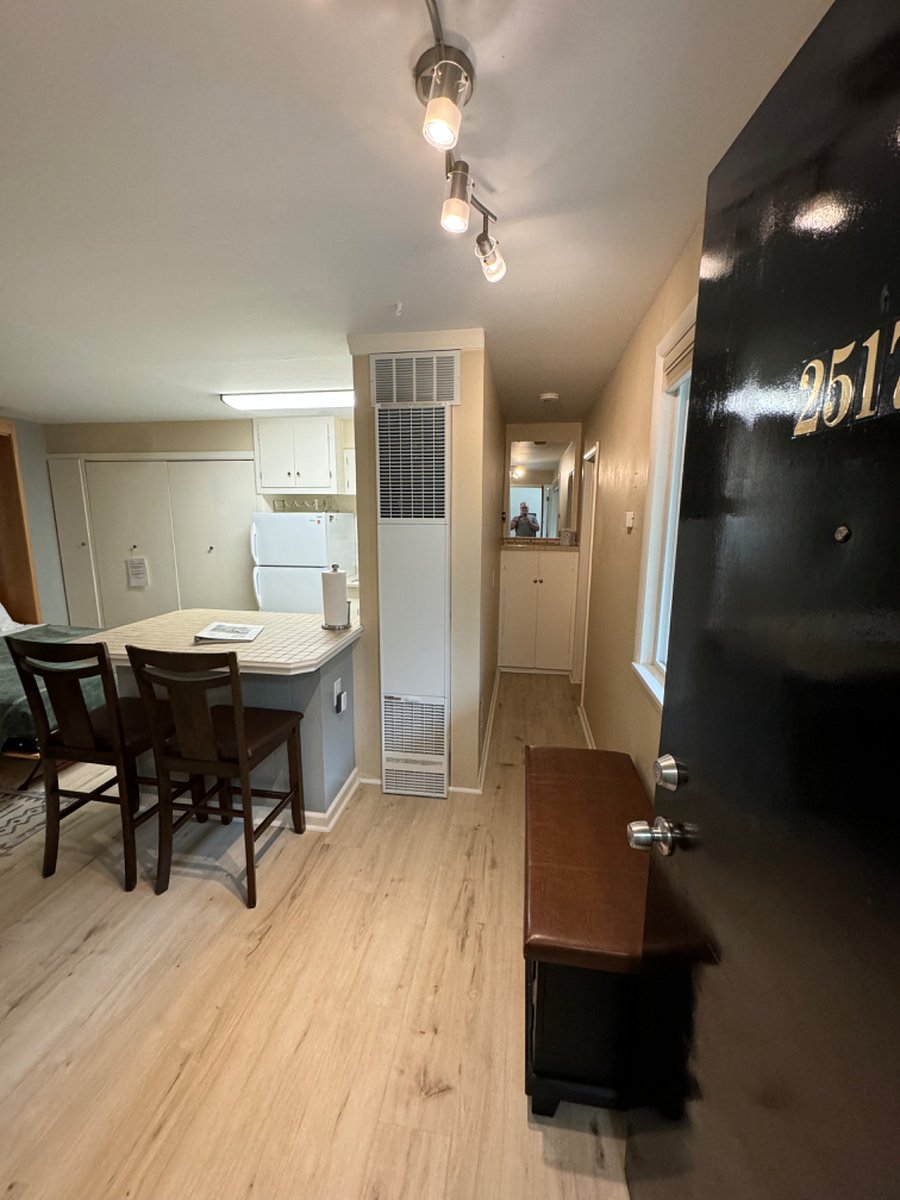 Hallway to Full Bath.  HVAC is unique to unit and controlled by Tenant!
