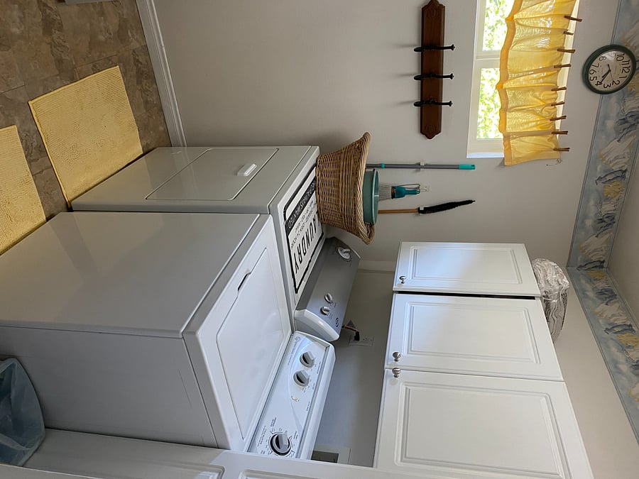 Well equipped modern/clean laundry room.