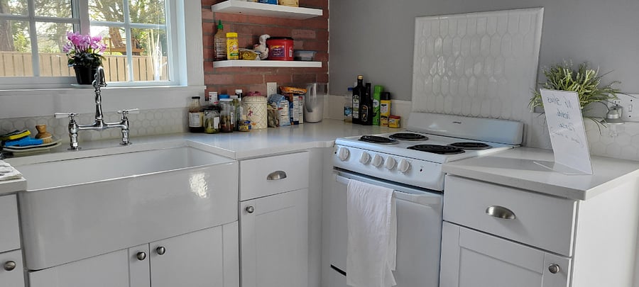 Enjoy your sunlit private kitchen with adjoining patio and hot tub