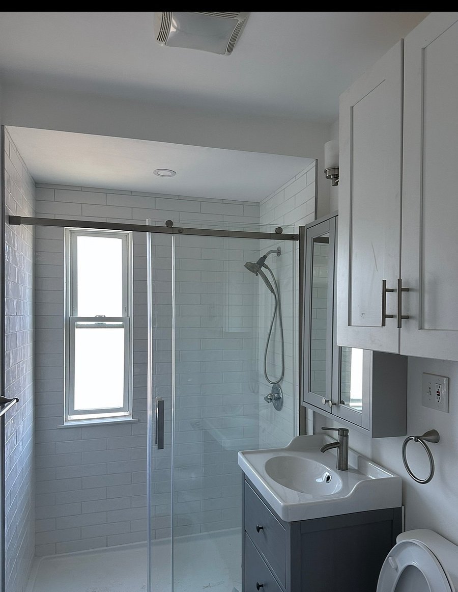 Brand new tiled bath with walk in shower (no tub) and great water pressure. 