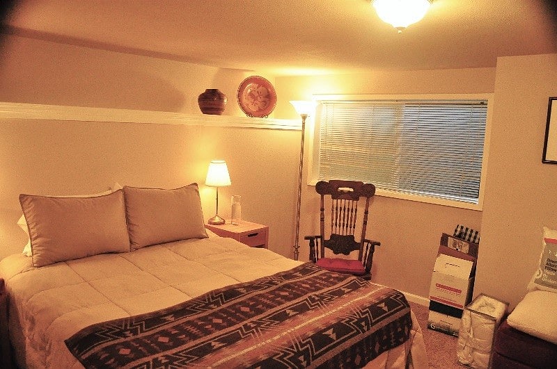 Bedroom showing window. Please ignore tenants' possessions seen in boxes.

