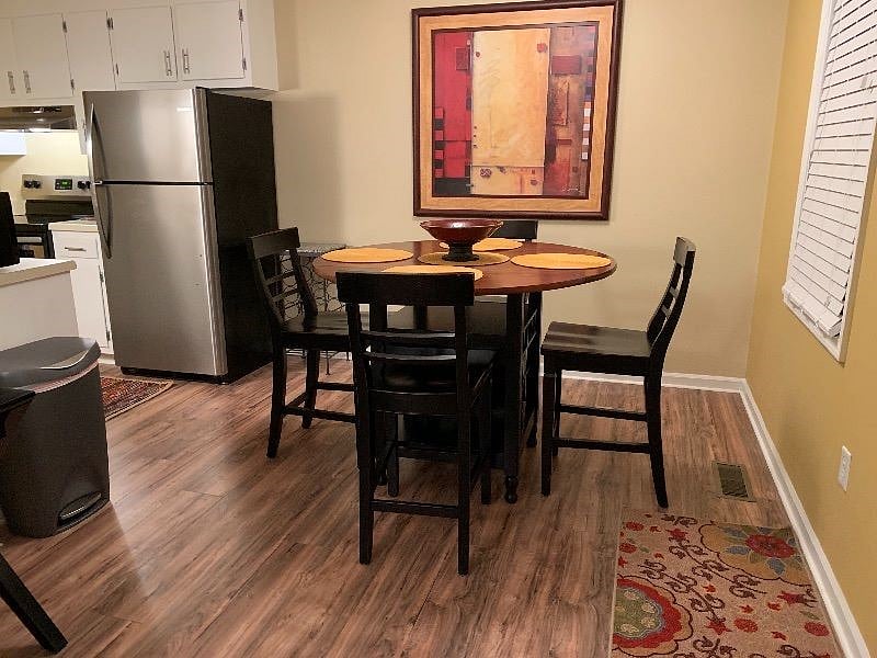 Dining table with wine storage in middle