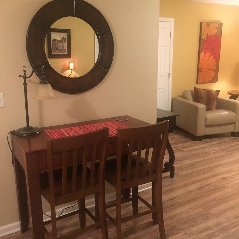 Desk with 2 bar height seats, can double as a standing desk