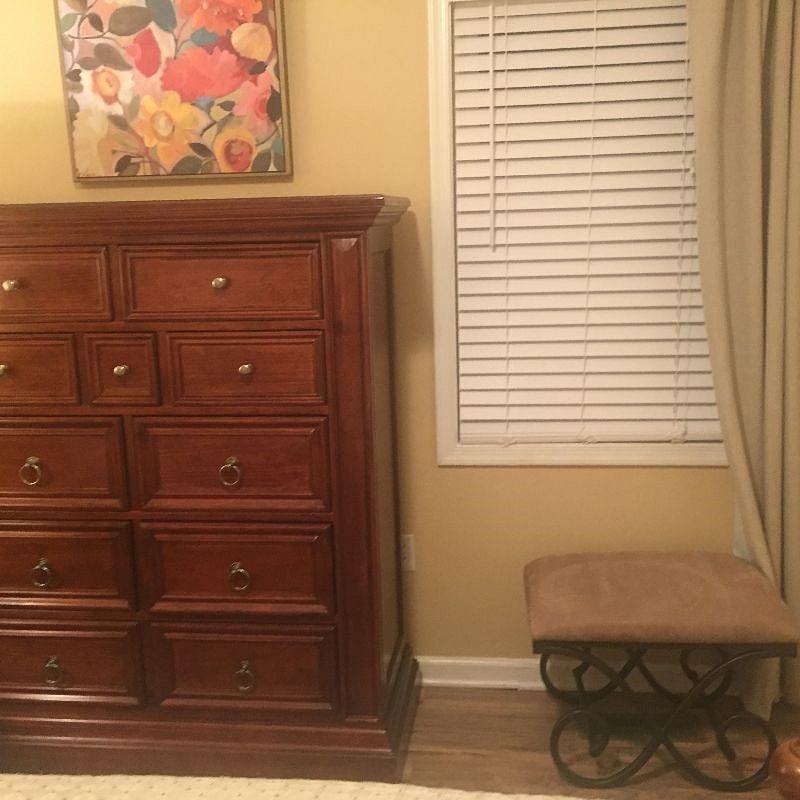 Bench and room darkening curtains