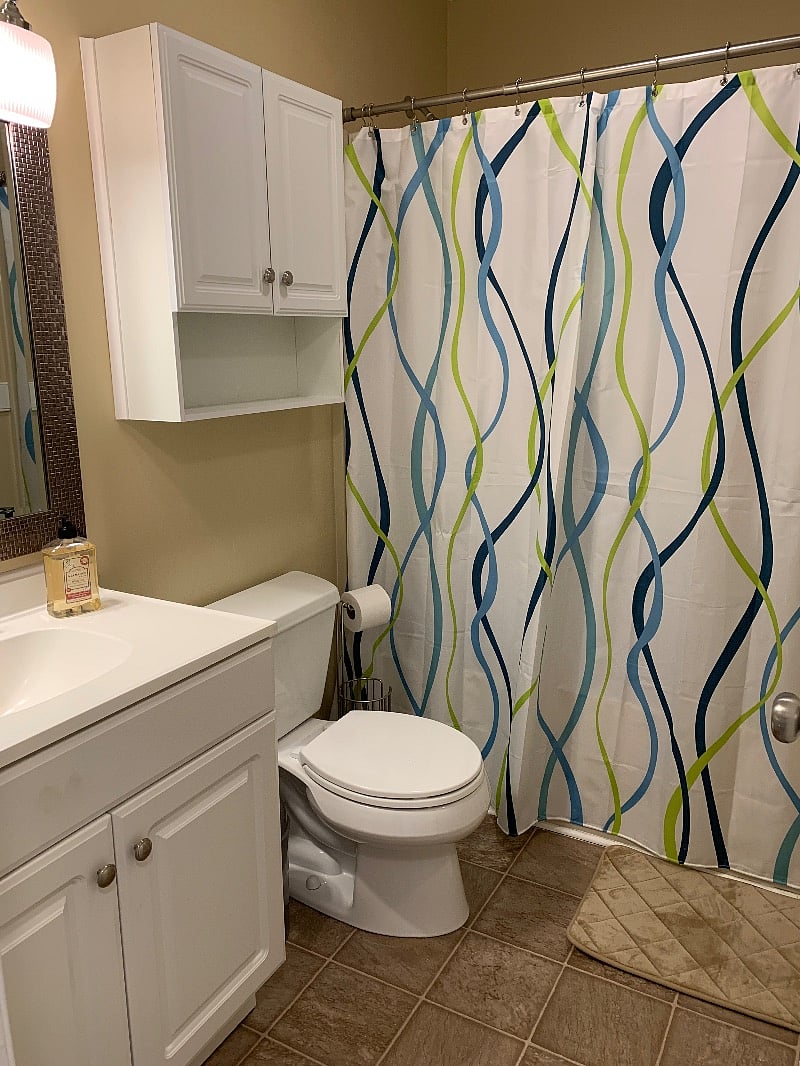 Full bathroom with shower/tub combo and extra cabinets for toiletries. Plenty of towels, soap and toilet paper to start off with are provided.