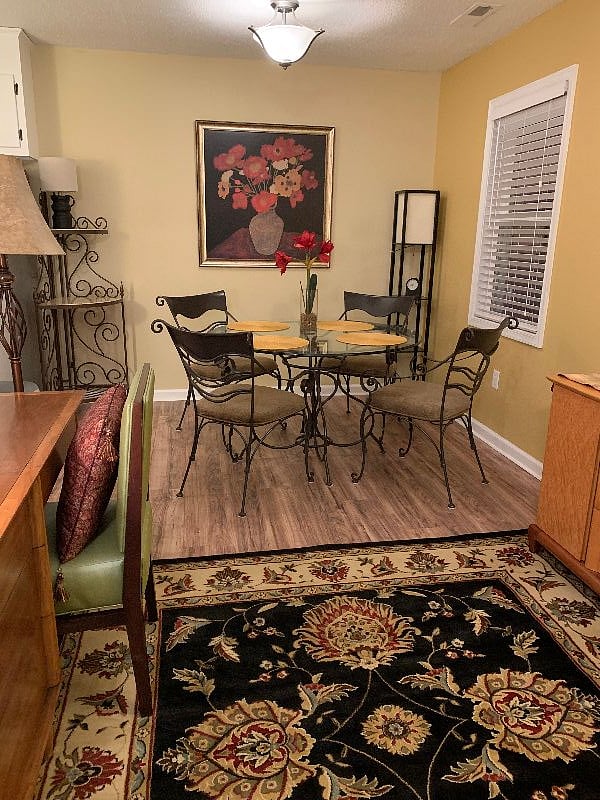 Lovely spot to eat with sturdy glass table and comfortable chairs.
