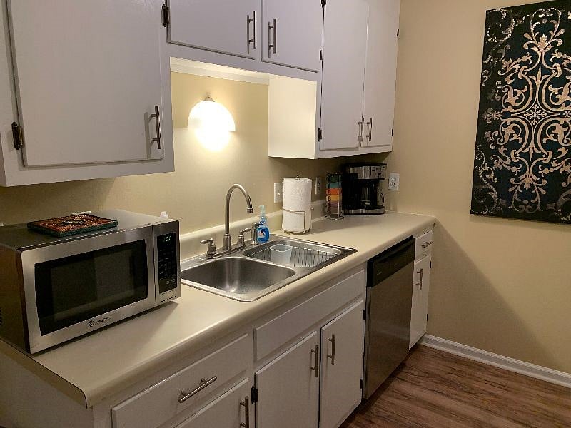 Stainless microwave, coffee maker, dishwasher and all the extras such as blender, mixer, crock pot.