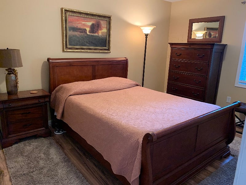 Queen bed and tall dresser for plenty of storage.