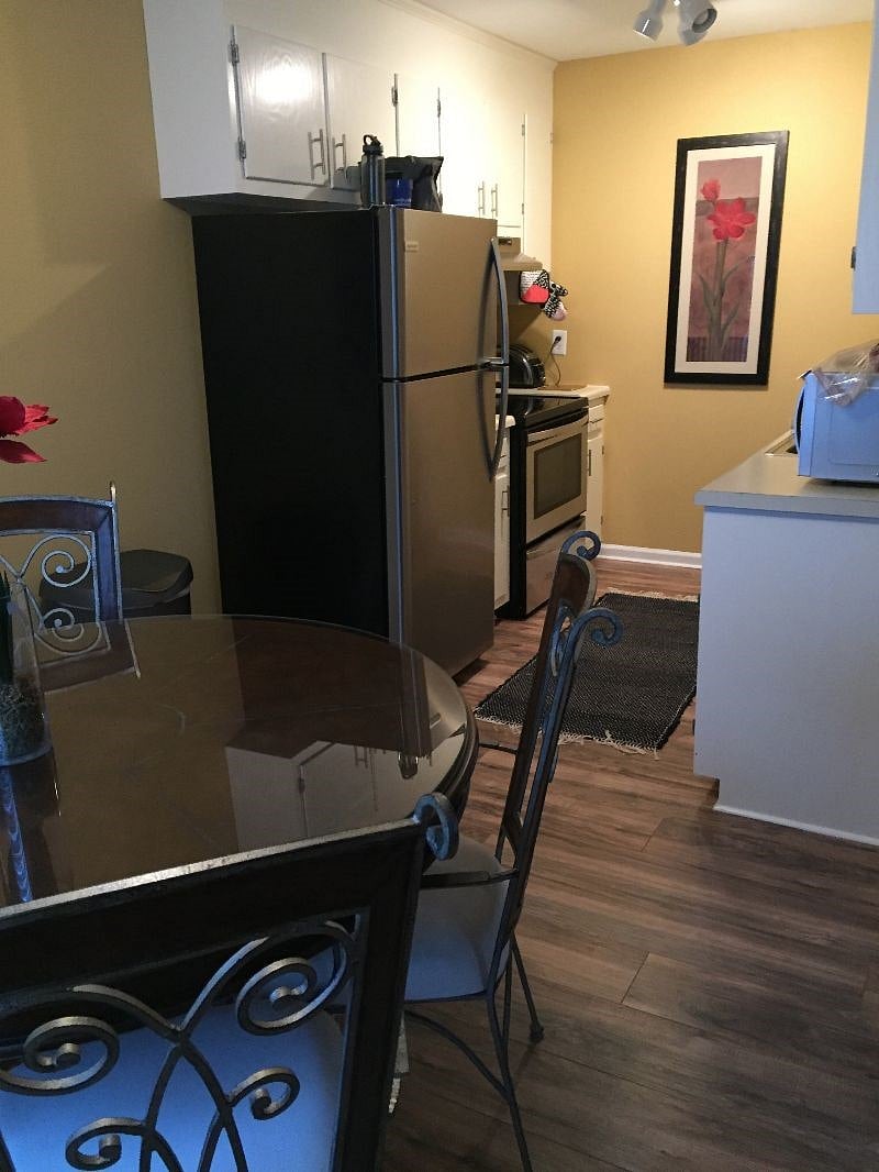 Dining area and adjacent kitchen.