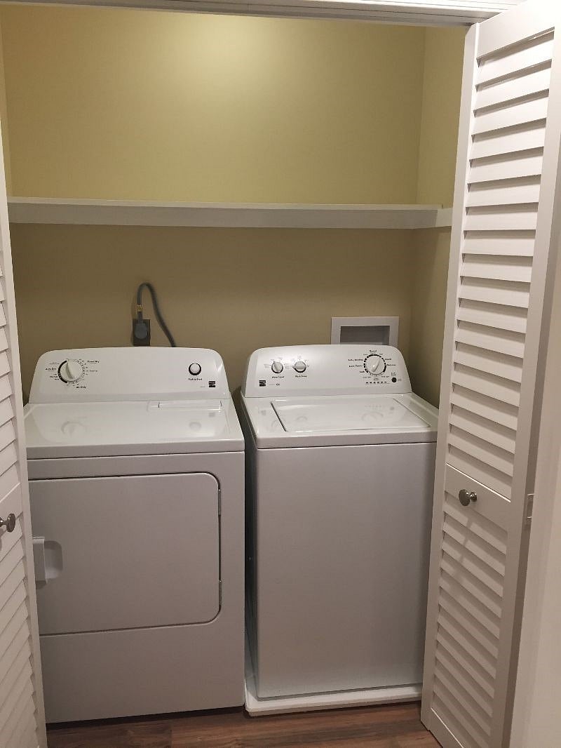 Full sized washer and dryer in unit.
