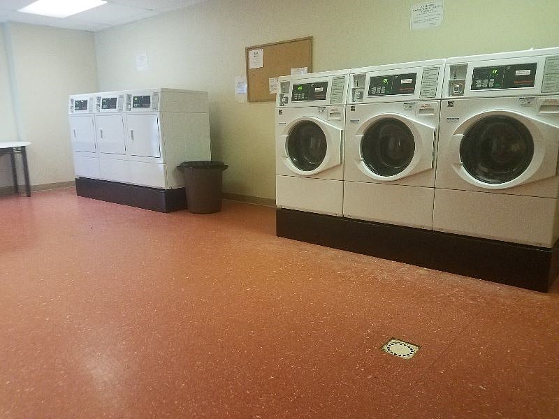 on premise laundry facility located on the first floor of a 3 floor building